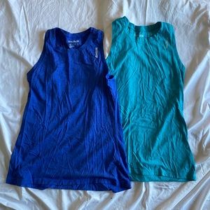 TWO Reebok tanks
